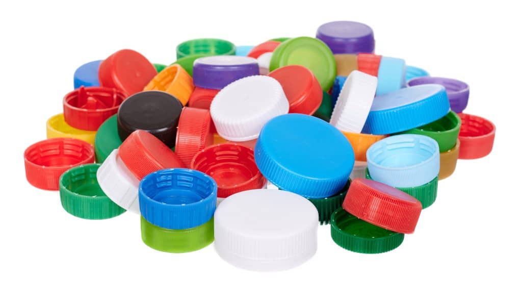 Plastic lids, isolated on white background.